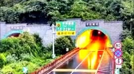 Road tunnel in China collapses after succumbing to weight of landslide from mountain above