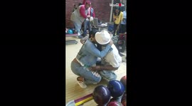 Love-struck! Surprise proposal at bowling alley leaves woman in tears