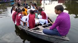Teachers conduct classes on boats amid floods in Bihar’s Katihar district