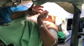 Woman plays flute during brain surgery in the Philippines