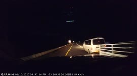 Dangerous driving by Taxi that passes over a white line to overtake - Dashcam