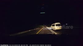 Dashcam footage of Dangerous driving by Taxi that passes over a solid white line to overtake