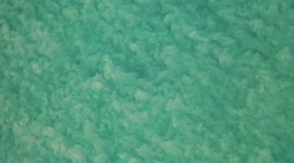 The world would be a better place if we all watched soothing drone videos of sandy oceans