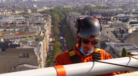 The Arc de Triomphe monument wrapped in 25,000 square meters of recyclable silvery blue polypropylene fabric