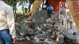 Police has distorted large quantities liquor bottles in northeastern India