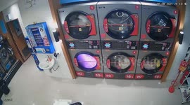 Add CCTV: Tumble dryer catches fire at laundrette in Thailand