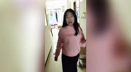 Chinese girl cries tears of joy as mother returns home after 6-month absence