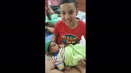 Funny boy love with baby boy to give gift