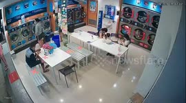 Add CCTV: Tumble dryer catches fire at laundrette in Thailand