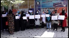 Defiant Afghan women protest Taliban gender restriction and all-male government