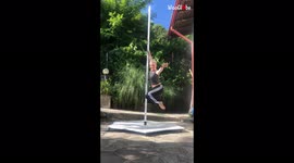 Amusing moment Italian pole dancer crashes to ground after losing her grip