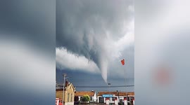 Huge tornado swirls debris into air as it strikes northern China