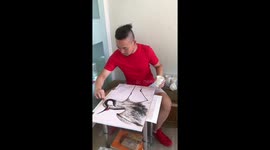 Chinese barber uses customers' cut hair to form detailed crane artwork