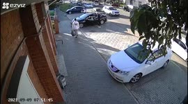 A woman driving a car hit two pedestrians into the wall