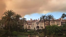 Spain: Smoke From Fire On Sierra Bermeja Mountains Shrouds Sky Above Malaga