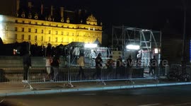 Fans of Jean-Paul Belmondo queue through the NIGHT to pay final respects to film icon
