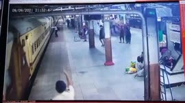 Scary moment man is dragged underneath moving train in India