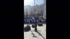 Health care workers blow horns and march in Poland to demand more funding