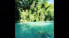 Bath in Colle Val del Elsa river during the summer in Italy