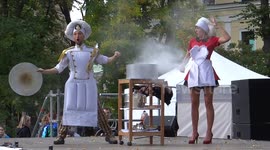Magician is baking a cake at the Sausage dog Parade show 2021 in St Petersburg, Russia