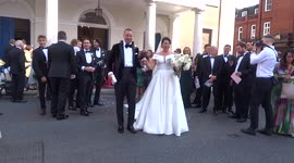 Church wedding in Mayfair - crowds greet the newlyweds as they leave Grosvenor Chapel after ceremony