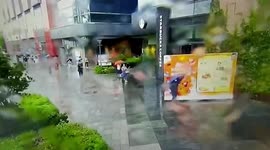 Chinese woman struck by metal board blown over by Typhoon Chanthu's winds