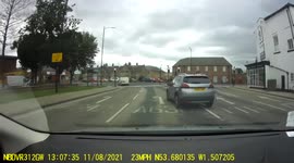 A car cuts in front of me then jumps a red light on Westgate in Wakefield