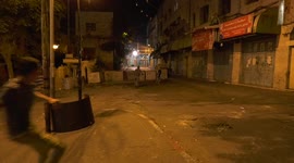 Protesters hurl rocks at Israeli forces during rally in support of arrested Palestinians