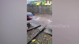 Typhoon Conson washes car away after river overflows in the Philippines