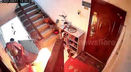 Chinese resident risks life to drag flaming gas cylinder out of building