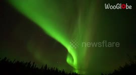 Stunning time-lapse clip captures Northern Lights swirling magically in Alaska