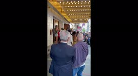 US: Cast Of Broadway Musical Sing “New York, New York” Outside NYC Theater