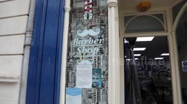 Britain’s longest serving barber is hanging up his scissors