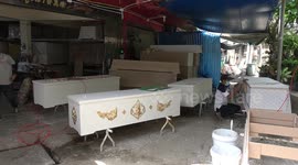 Coffin maker describes surge in orders during Covid-19 pandemic in Thailand
