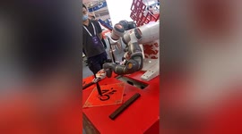 Robot perfects Chinese calligraphy at tech conference in China