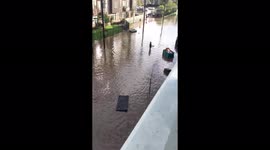 Baton Rouge locals walk through knee-deep flood due to Tropical Depression Nicholas