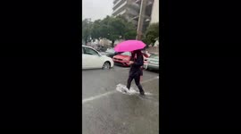 POV look at shin-deep flooding in Baton Rouge at LSU due to Tropical Depression Nicholas