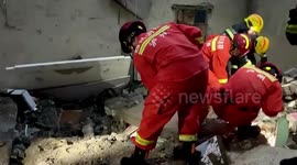 Firefighters search for survivors trapped under rubble after 6.0-magnitude earthquake hits southern China