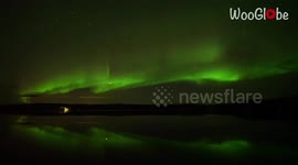 'VIBRANT Aurora Lights Illuminate the Sky Above Birch Lake in Alaska (Timelapse)'