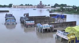 Towns left in ruins as deadly floods ravage western Indian state