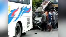 Two injured after truck crushes minibus in southern China