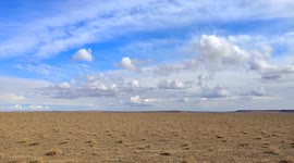 Timelapse Of Blue Sky And White Clouds Above The Desert In Jiuquan, Gansu, China