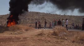 Palestinian protesters clash with Israeli security