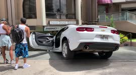 Bad driver alert! Woman accidentally drives new Camaro down stairway