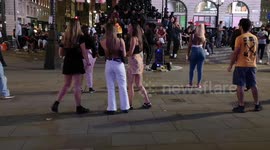 People On A Friday Night Having A Dance In Piccadilly Circus