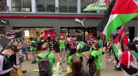 Pro-Palestine protesters stage a demonstration outside London branch of Puma