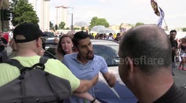 Driver threatens to beat up Covid vaccine protesters today in Camden, London, during medical freedom march.