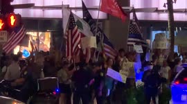 Anti vaccine and pro trump protesters in hawaii, Oahu, Waikiki. Streets blocked, police present as anti vaccine protesters take over Waikiki