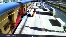 Elderly woman spun around by moving train after falling onto track in India
