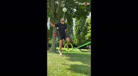 What can't this guy do? Circus performer juggles as he balances on slackline